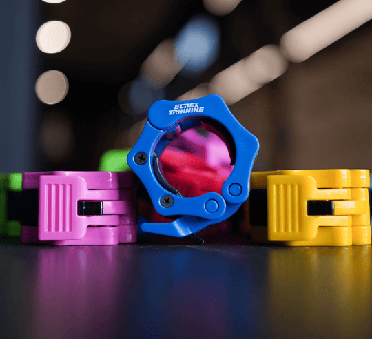 Abrazaderas para barra Olímpica Rosa - Elitex Training