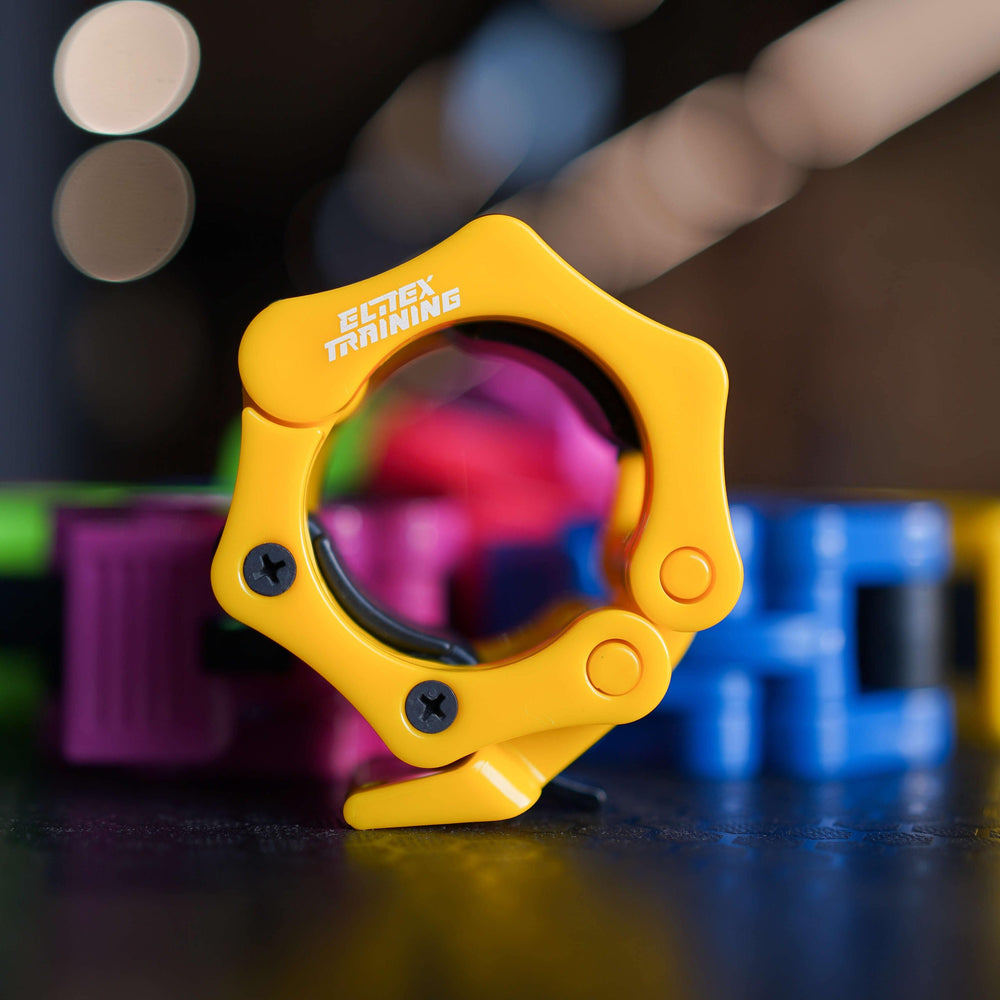 Abrazaderas para barra Olímpica Amarillo - Elitex Training