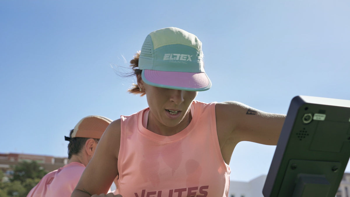 Athlete wearing a pastel-toned AeroFlow cap during an outdoor workout